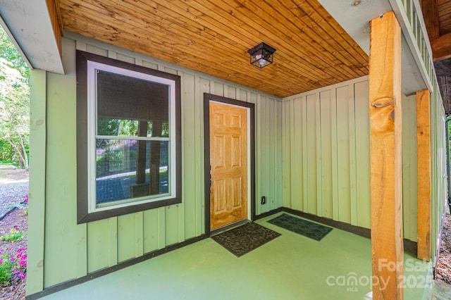 2448 Alfred Hartley Rd, Lenoir, NC 28645 - doorway to property featuring board and batten siding and a porch