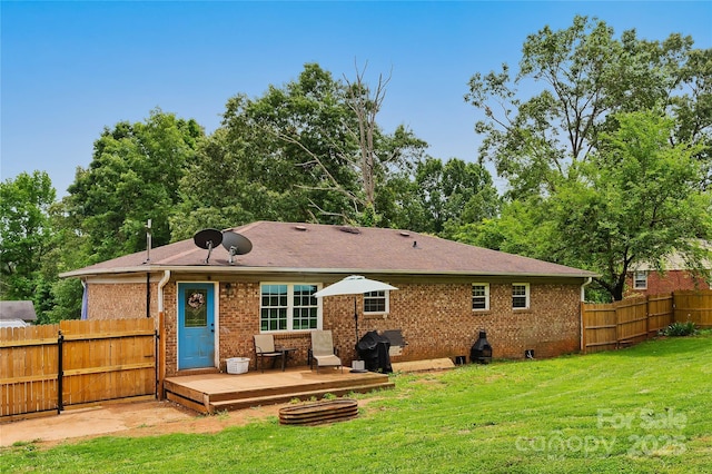 381 Mountain View St, Forest City, NC 28043 - back of house featuring a wooden deck and brick siding
