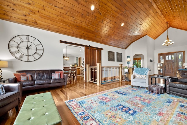 2160 Valle Cay Dr, Vilas, NC 28692 - living area featuring a chandelier, wood finished floors, wood ceiling, and high vaulted ceiling