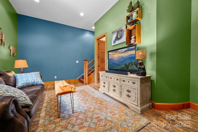 2160 Valle Cay Dr, Vilas, NC 28692 - living room with wood finished floors, recessed lighting, stairway, and baseboards