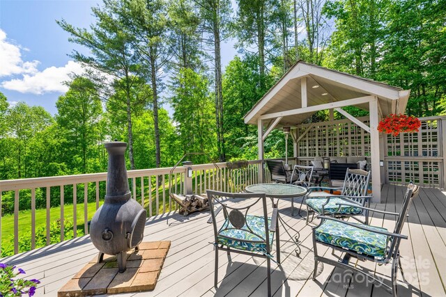 2160 Valle Cay Dr, Vilas, NC 28692 - wooden deck featuring view of scattered trees