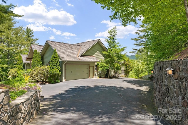2160 Valle Cay Dr, Vilas, NC 28692 - view of front facade with driveway and a garage