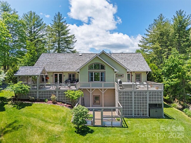 2160 Valle Cay Dr, Vilas, NC 28692 - rear view of house with a lawn, a deck, and french doors