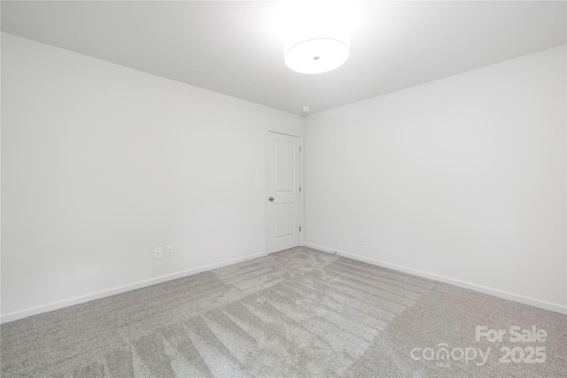 2313 Stallings Rd, Harrisburg, NC 28075 - spare room featuring carpet floors and baseboards