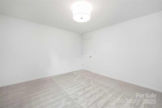 2313 Stallings Rd, Harrisburg, NC 28075 - carpeted empty room with baseboards