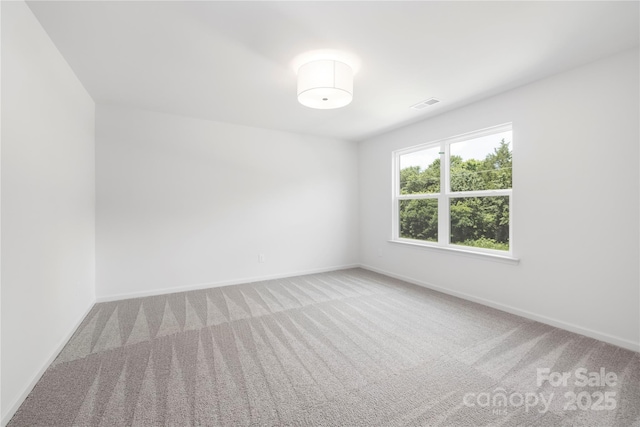 2313 Stallings Rd, Harrisburg, NC 28075 - carpeted empty room with baseboards