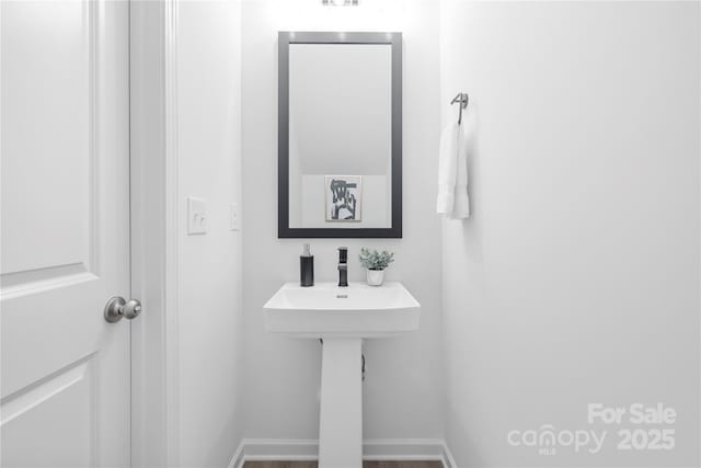 2313 Stallings Rd, Harrisburg, NC 28075 - bathroom featuring baseboards