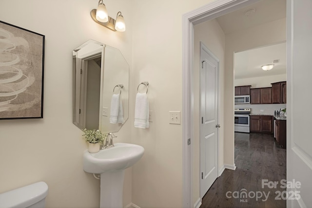 5160 Thomasville Dr Unit 123, Belmont, NC 28012 - bathroom featuring wood finished floors and toilet