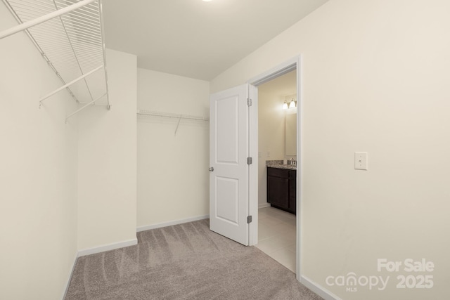 5160 Thomasville Dr Unit 123, Belmont, NC 28012 - spacious closet with light colored carpet and a sink