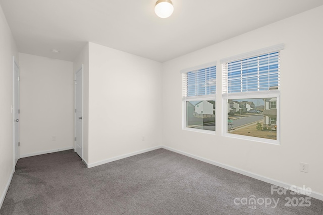 5160 Thomasville Dr Unit 123, Belmont, NC 28012 - unfurnished room featuring dark colored carpet and baseboards