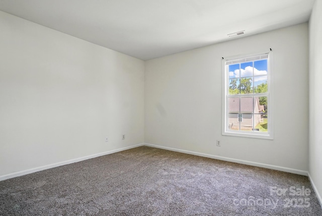 8605 Sawleaf Ct, Charlotte, NC 28215 - carpeted empty room featuring baseboards