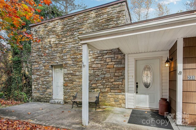 231 Highlands Loop, Maggie Valley, NC 28751 - property entrance with stone siding