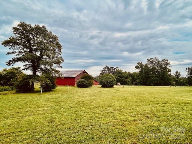 6714 Old Shelby Rd, Vale, NC 28168 - view of grassy yard featuring an outdoor structure and a pole building