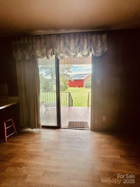 6714 Old Shelby Rd, Vale, NC 28168 - unfurnished dining area with wood finished floors and wooden walls