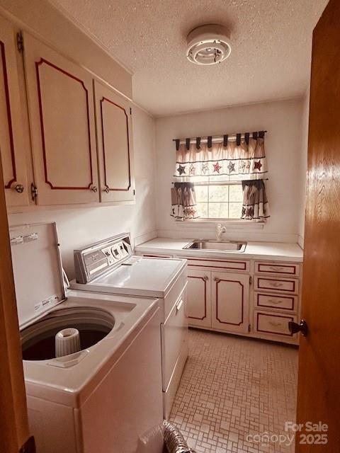 6714 Old Shelby Rd, Vale, NC 28168 - washroom with cabinet space, independent washer and dryer, and a textured ceiling