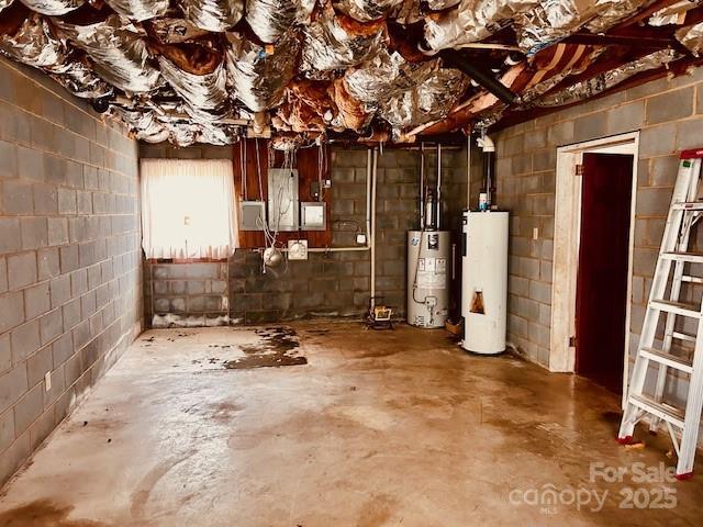 6714 Old Shelby Rd, Vale, NC 28168 - basement featuring water heater, gas water heater, concrete block wall, and electric panel
