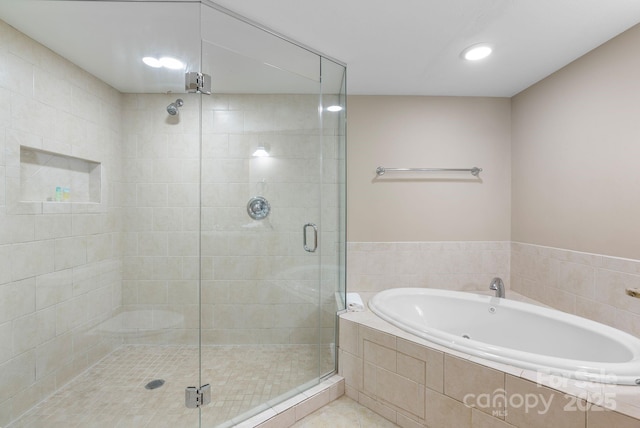 408 Bowling Park Rd, Asheville, NC 28803 - full bathroom with a bath, a shower stall, recessed lighting, and tile patterned flooring