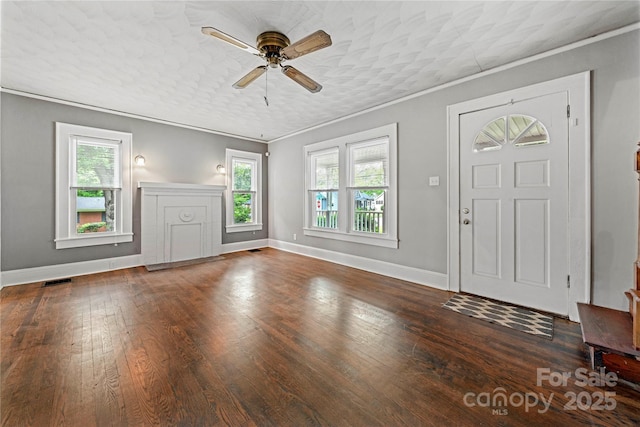 725 W Graham St, Shelby, NC 28150 - entryway with ceiling fan, plenty of natural light, baseboards, wood finished floors, and ornamental molding