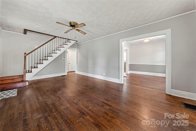 725 W Graham St, Shelby, NC 28150 - unfurnished living room featuring crown molding, ceiling fan, stairway, wood finished floors, and baseboards