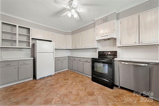 725 W Graham St, Shelby, NC 28150 - kitchen with freestanding refrigerator, black range with electric stovetop, under cabinet range hood, dishwasher, and gray cabinets