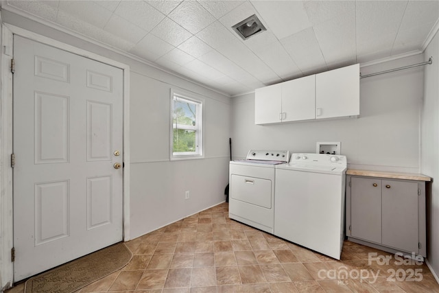 725 W Graham St, Shelby, NC 28150 - laundry room featuring cabinet space, ornamental molding, and washing machine and dryer