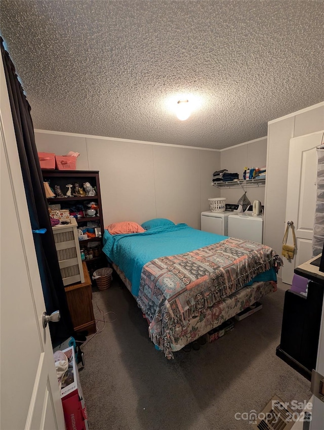 8827 Spring Meadow Dr, Hickory, NC 28601 - bedroom with washing machine and clothes dryer, carpet flooring, a textured ceiling, and ornamental molding