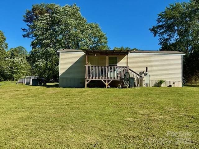 8827 Spring Meadow Dr, Hickory, NC 28601 - back of property with a yard and a deck