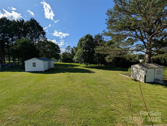 8827 Spring Meadow Dr, Hickory, NC 28601 - view of grassy yard featuring view of wooded area