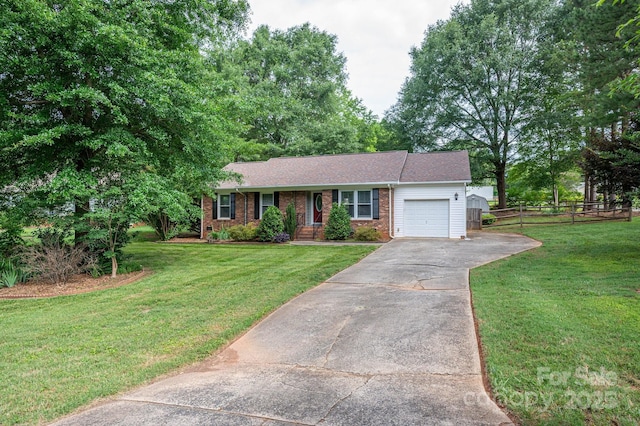 2418 Live Oak Ct, Gastonia, NC 28056 - ranch-style home featuring an attached garage, driveway, brick siding, and a shingled roof