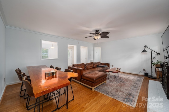 2418 Live Oak Ct, Gastonia, NC 28056 - living area featuring ceiling fan, ornamental molding, light wood finished floors, and baseboards