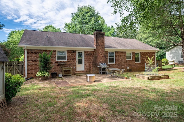 2418 Live Oak Ct, Gastonia, NC 28056 - rear view of property with brick siding, a patio area, a vegetable garden, a chimney, and a shingled roof