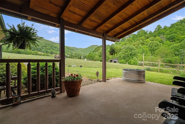 101 Trinity Dr, Clyde, NC 28721 - view of patio / terrace with a forest view, a mountain view, and a view of rural / pastoral area