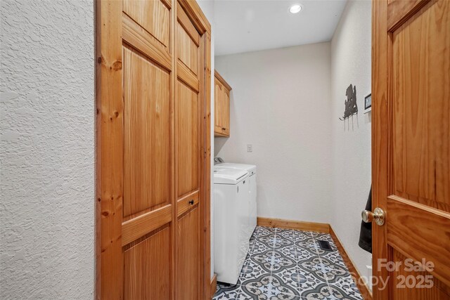 101 Trinity Dr, Clyde, NC 28721 - laundry area with cabinet space, washer and dryer, light tile patterned floors, baseboards, and recessed lighting
