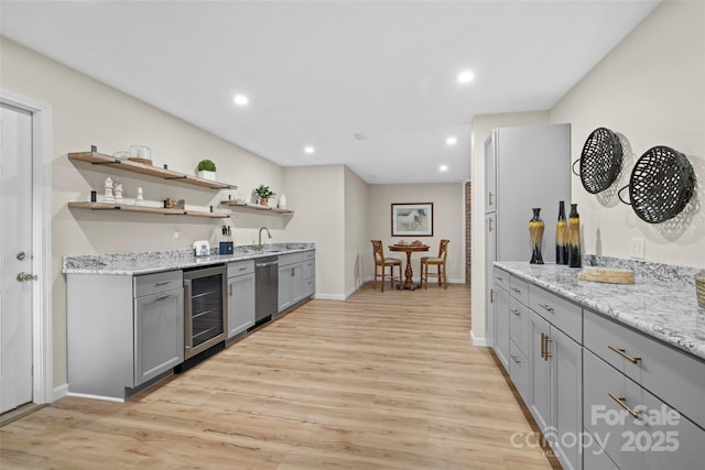 101 Trinity Dr, Clyde, NC 28721 - kitchen with beverage cooler, gray cabinets, stainless steel dishwasher, open shelves, and recessed lighting