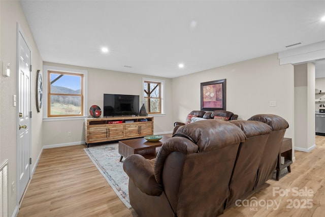 101 Trinity Dr, Clyde, NC 28721 - living room with baseboards, light wood-style floors, and recessed lighting