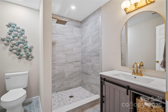 101 Trinity Dr, Clyde, NC 28721 - full bathroom with vanity, a tile shower, toilet, and baseboards