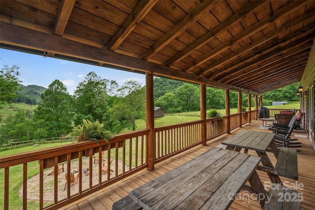 101 Trinity Dr, Clyde, NC 28721 - wooden terrace with a yard, view of wooded area, and an outdoor structure