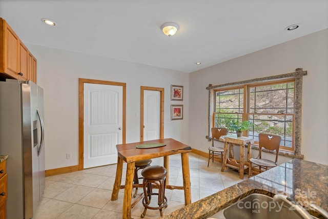 140 Spruce Hollow Rd, Beech Mountain, NC 28604 - dining space featuring baseboards, light tile patterned flooring, and recessed lighting