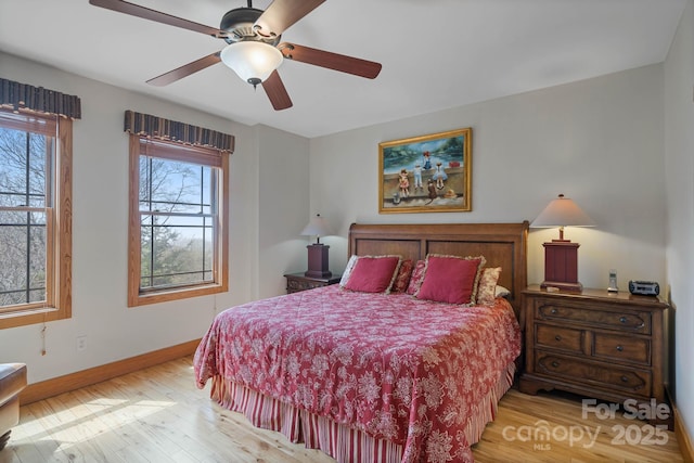 140 Spruce Hollow Rd, Beech Mountain, NC 28604 - bedroom featuring wood finished floors, baseboards, and a ceiling fan