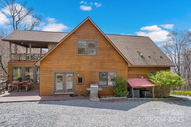 140 Spruce Hollow Rd, Beech Mountain, NC 28604 - chalet / cabin with french doors, a wooden deck, roof with shingles, and a balcony