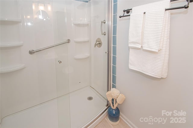 10945 Winterbourne Ct, Charlotte, NC 28277 - bathroom with a stall shower and baseboards