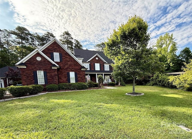 4230 Berry Hill Ct, Concord, NC 28025 - traditional home with a front lawn and brick siding
