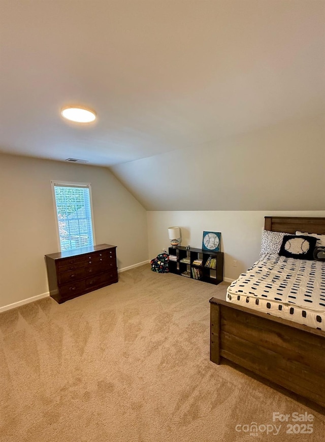 4230 Berry Hill Ct, Concord, NC 28025 - carpeted bedroom featuring lofted ceiling and baseboards