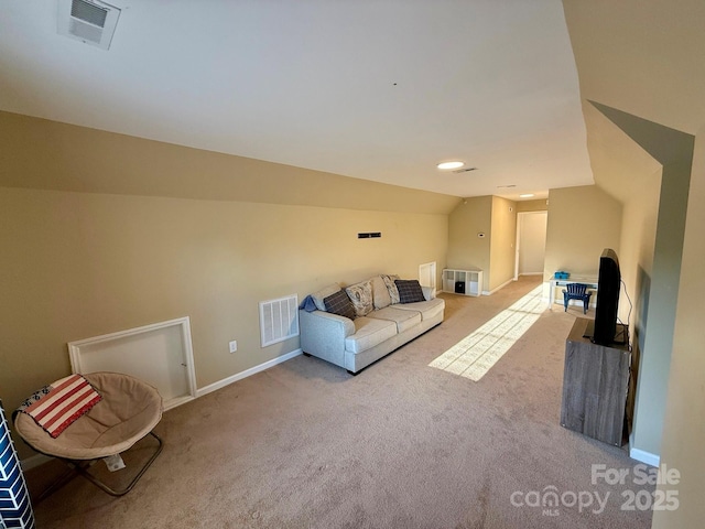 4230 Berry Hill Ct, Concord, NC 28025 - carpeted living room featuring vaulted ceiling and baseboards