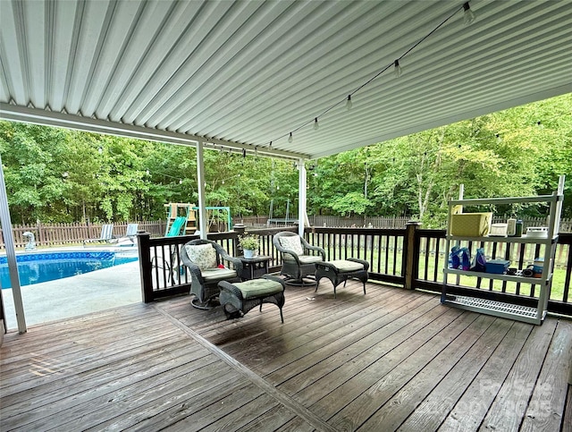 4230 Berry Hill Ct, Concord, NC 28025 - wooden terrace featuring a fenced backyard and a playground
