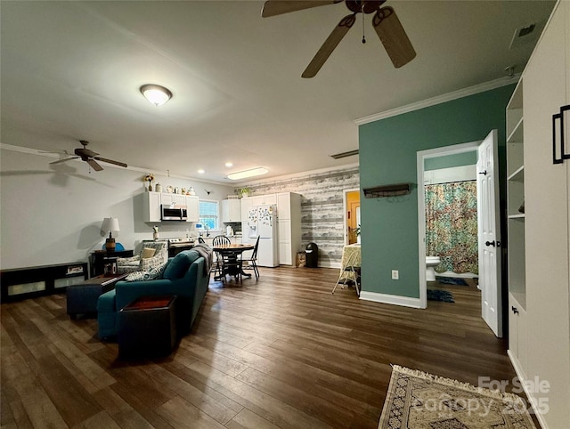 4230 Berry Hill Ct, Concord, NC 28025 - living area featuring ceiling fan, ornamental molding, dark wood-style flooring, an accent wall, and recessed lighting