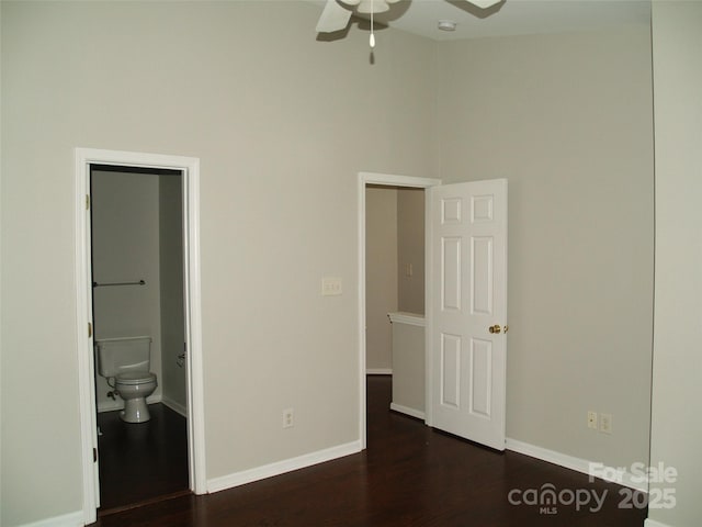 11107 Lions Mane St, Charlotte, NC 28273 - unfurnished bedroom with wood finished floors, ensuite bath, and baseboards