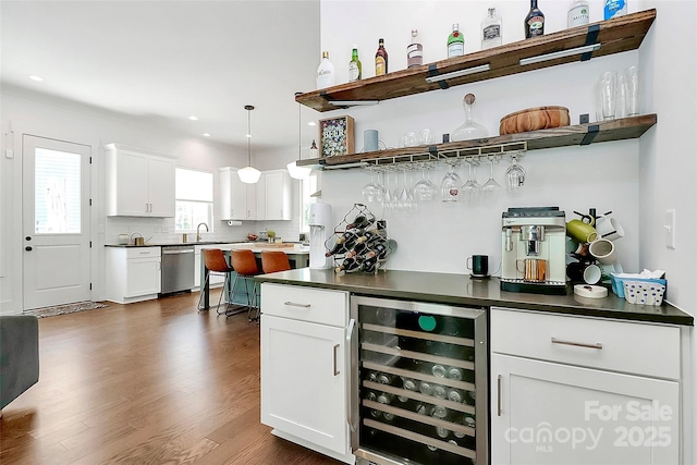 2600 Palm Ave, Charlotte, NC 28205 - indoor dry bar featuring beverage cooler, dishwasher, dark wood-style flooring, recessed lighting, and backsplash