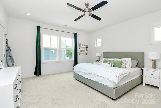 2600 Palm Ave, Charlotte, NC 28205 - bedroom featuring light colored carpet, multiple windows, recessed lighting, a ceiling fan, and baseboards