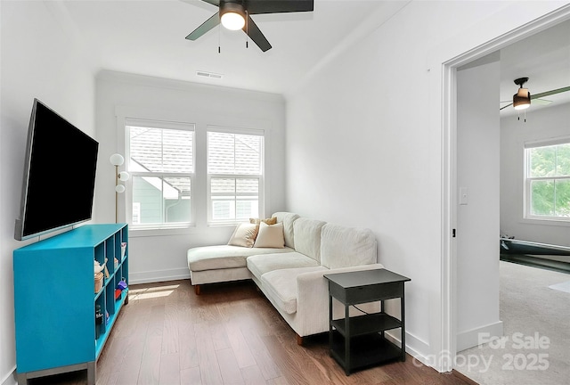 2600 Palm Ave, Charlotte, NC 28205 - living area with ceiling fan, wood finished floors, and baseboards